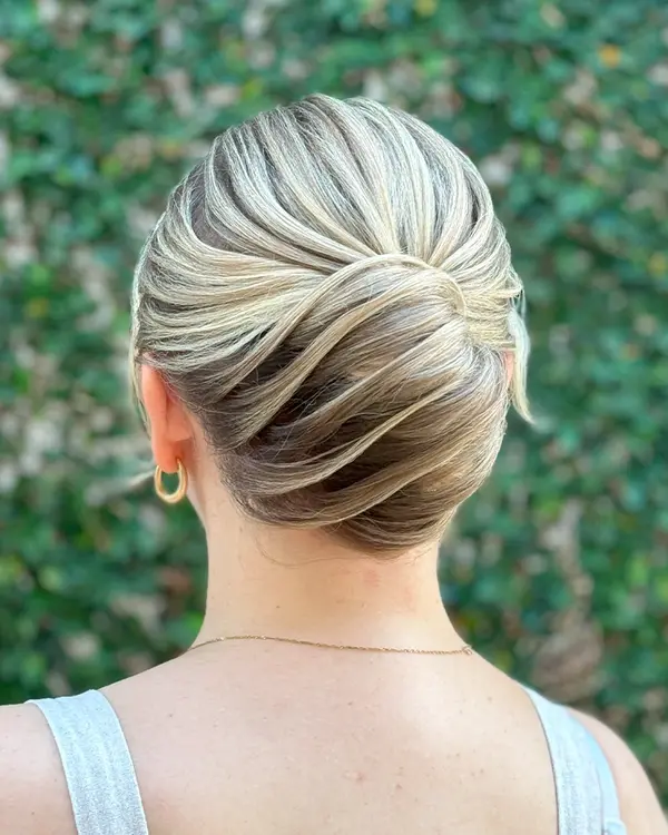 Penteado feito por Amanda Giaretton em atendimento